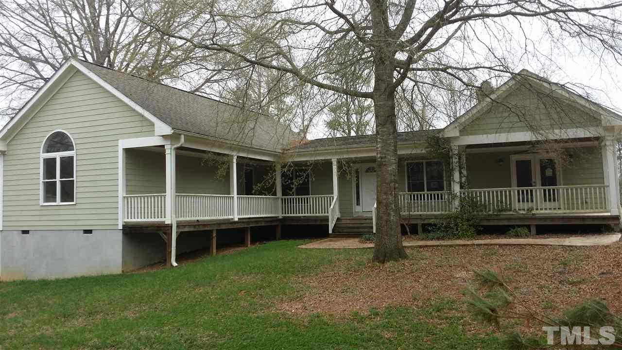 1425 Goodwin Road Apex, NC 27523 - Photo 1 of 23 a front view of a house with a yard