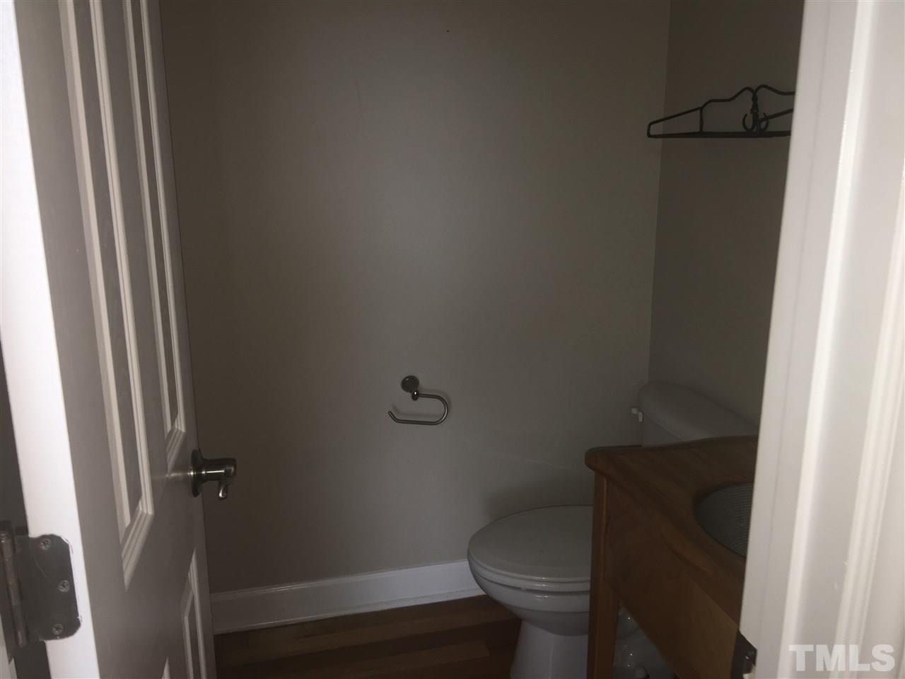 1425 Goodwin Road Apex, NC 27523 - Photo 19 of 23 a bathroom with a toilet and a shower