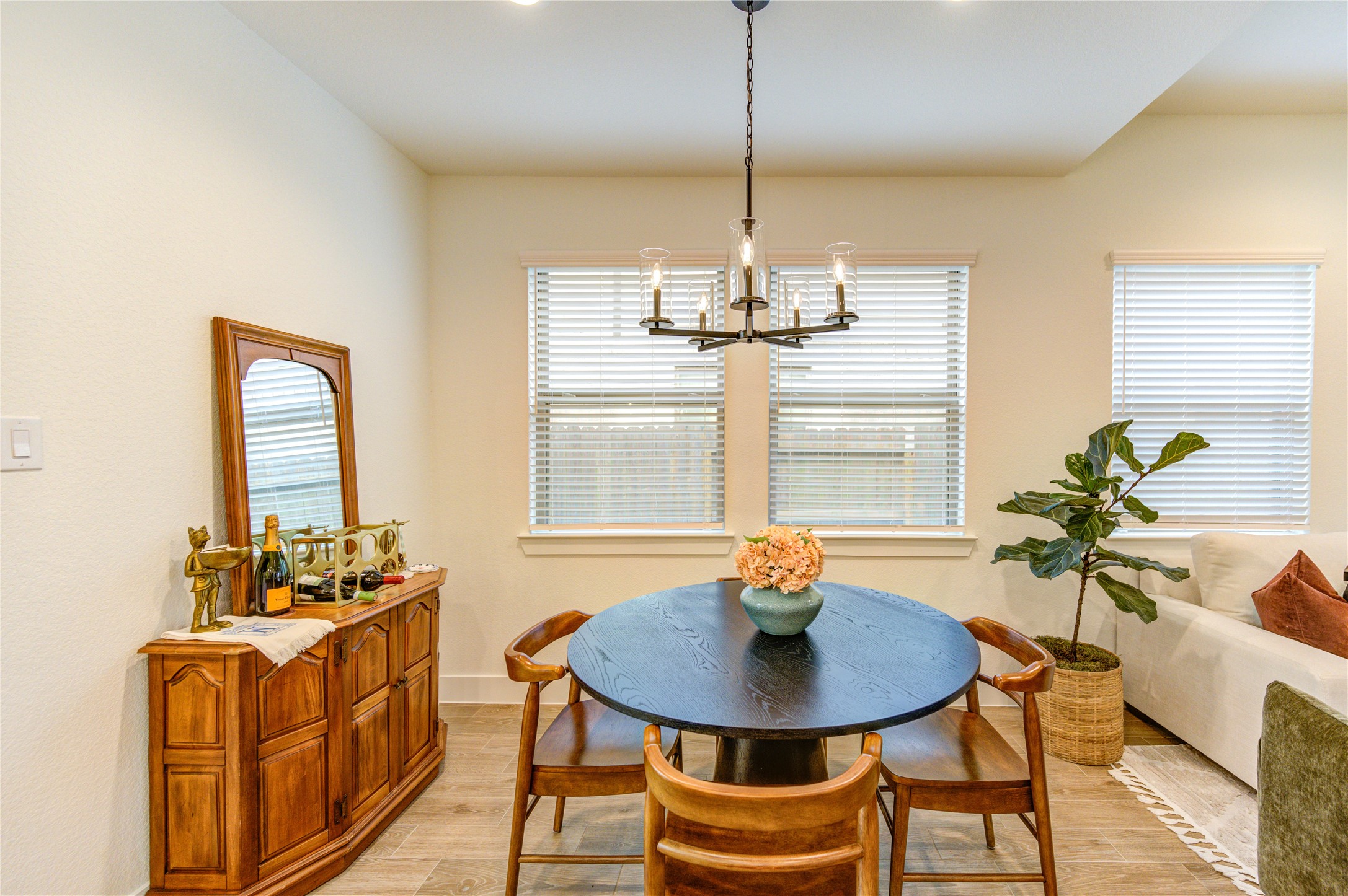 17758 Tree Of Heaven Conroe, TX 77385 - Photo 18 of 44 a view of a dining room with furniture window and wooden floor