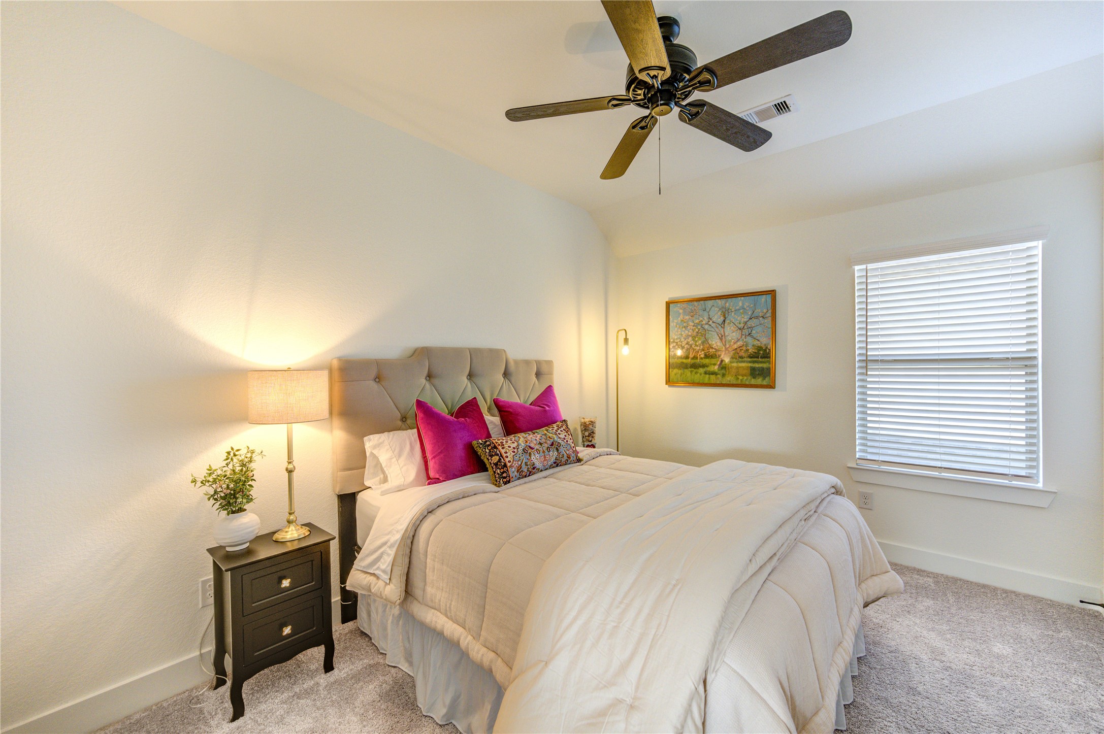 17758 Tree Of Heaven Conroe, TX 77385 - Photo 36 of 44 a bedroom with a bed and a window