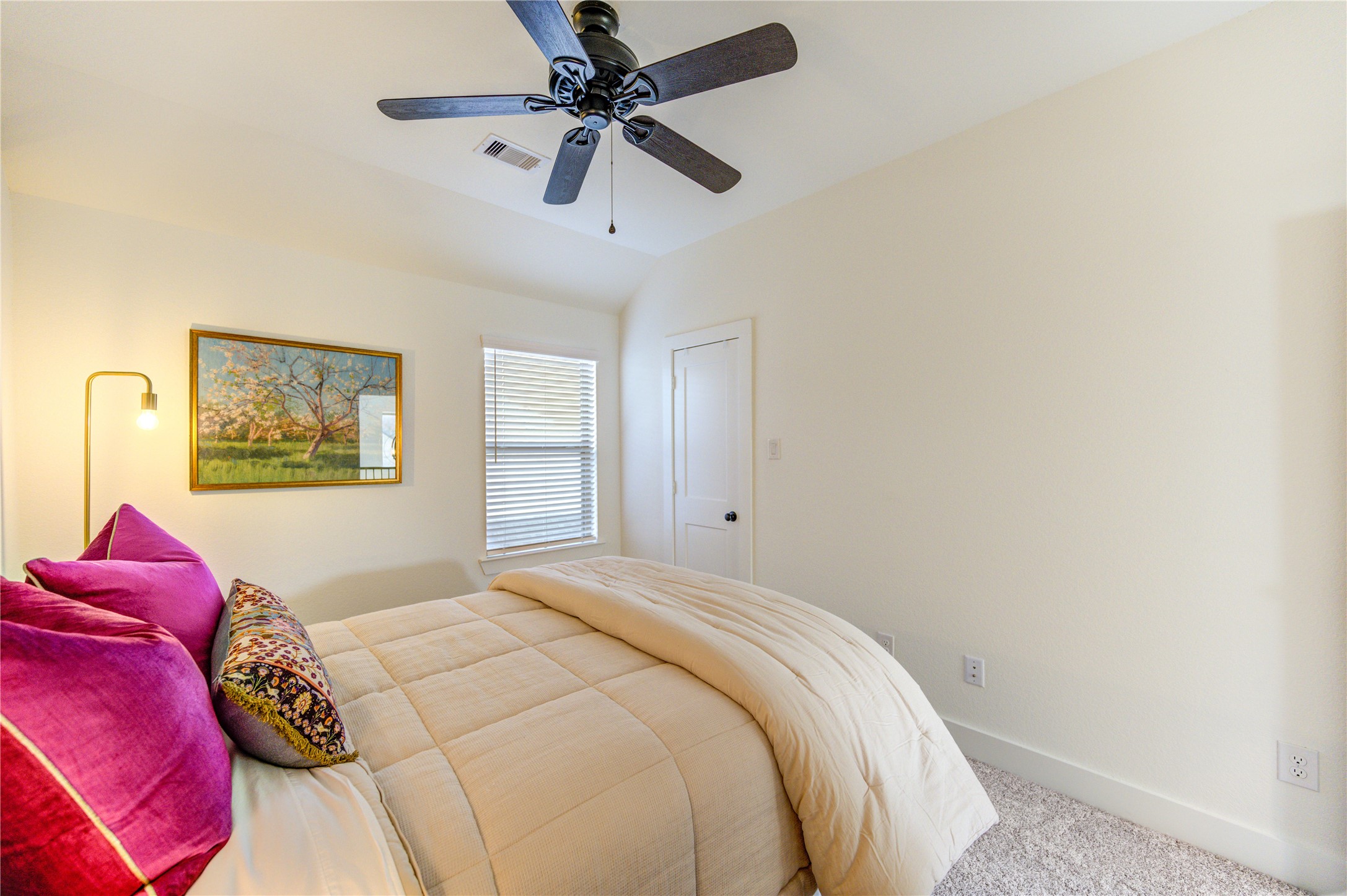 17758 Tree Of Heaven Conroe, TX 77385 - Photo 37 of 44 a bedroom with a large bed and a window