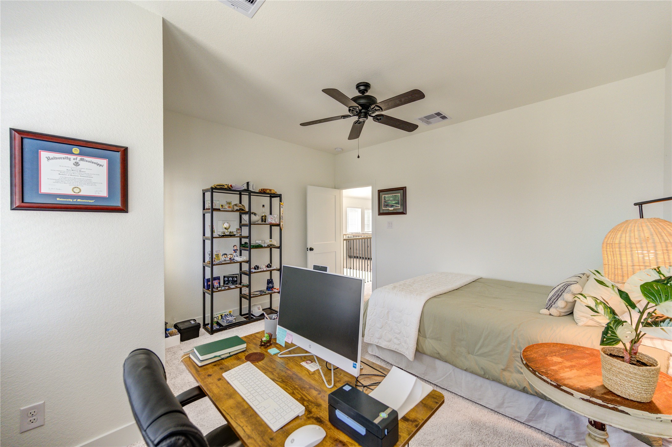 17758 Tree Of Heaven Conroe, TX 77385 - Photo 39 of 44 a room with a couch and a view of kitchen