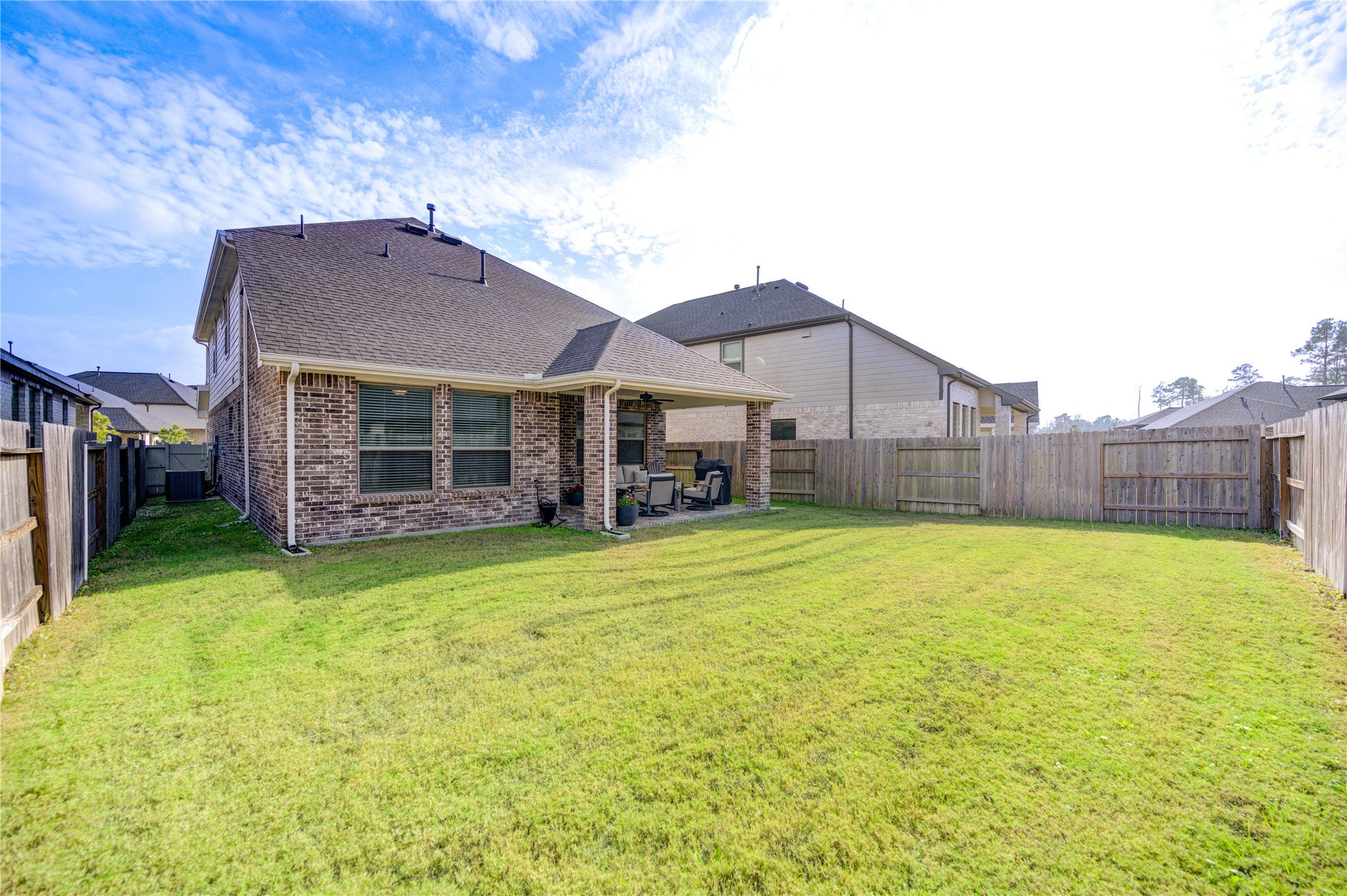 17758 Tree Of Heaven Conroe, TX 77385 - Photo 41 of 44 a house view with a garden space