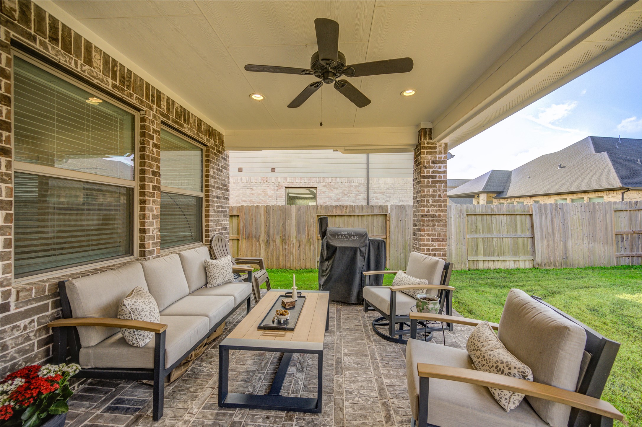 17758 Tree Of Heaven Conroe, TX 77385 - Photo 44 of 44 a living room with furniture and a fireplace