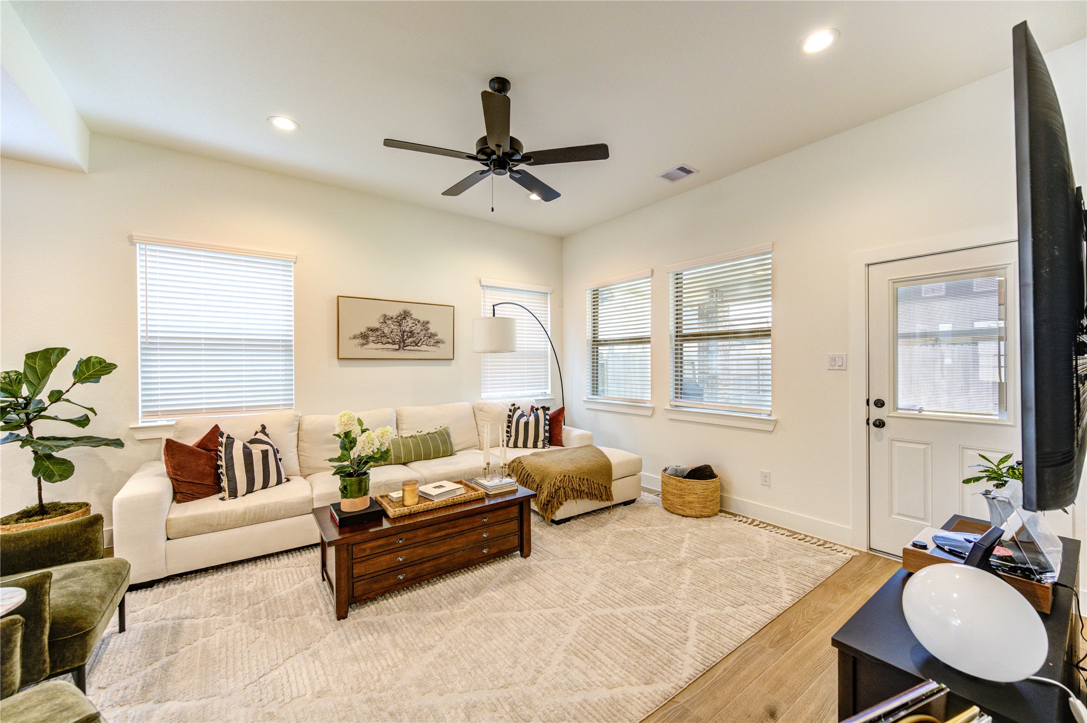 17758 Tree Of Heaven Conroe, TX 77385 - Photo 5 of 44 a living room with furniture and a large window