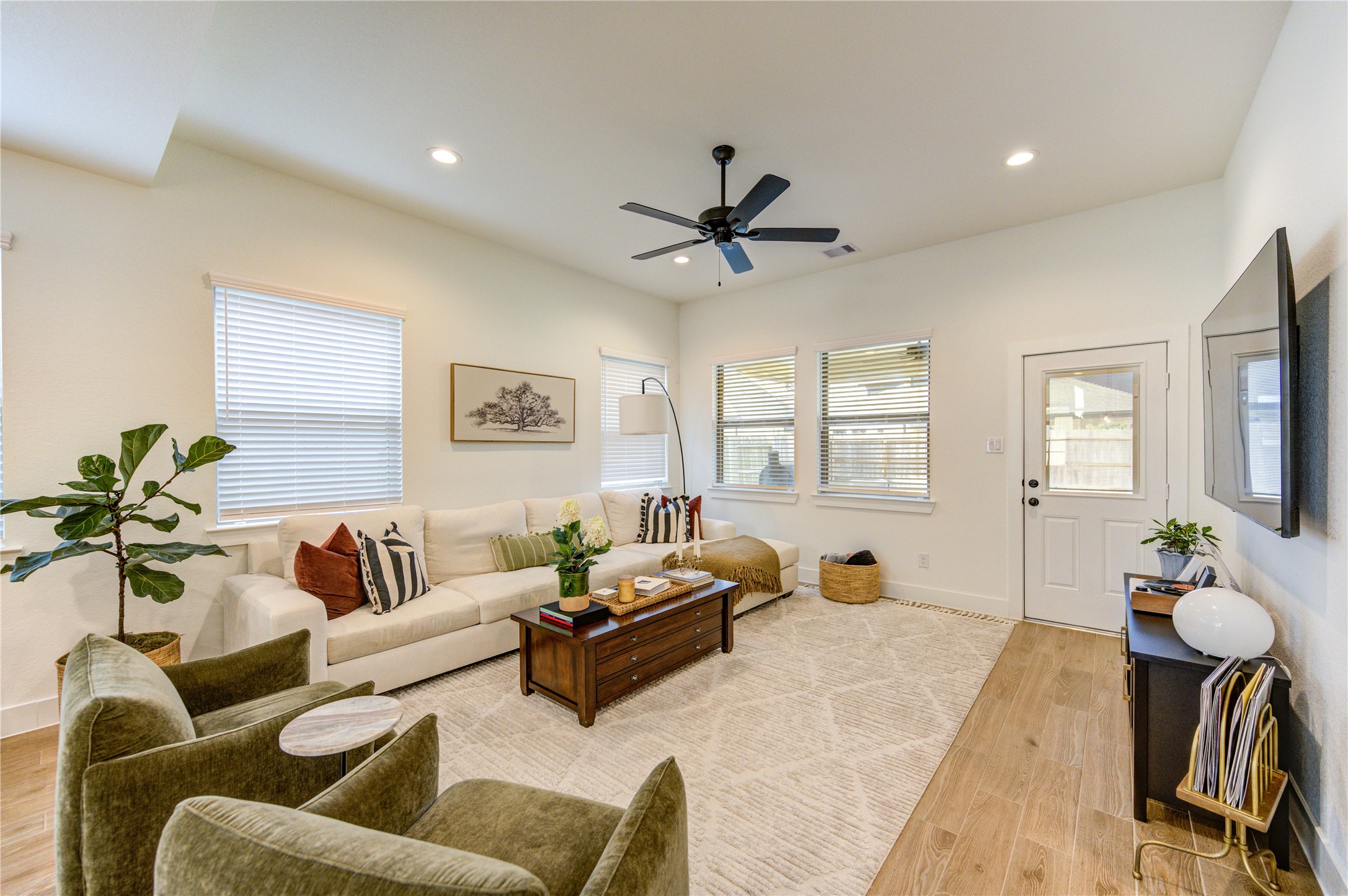 17758 Tree Of Heaven Conroe, TX 77385 - Photo 6 of 44 a living room with furniture and a large window