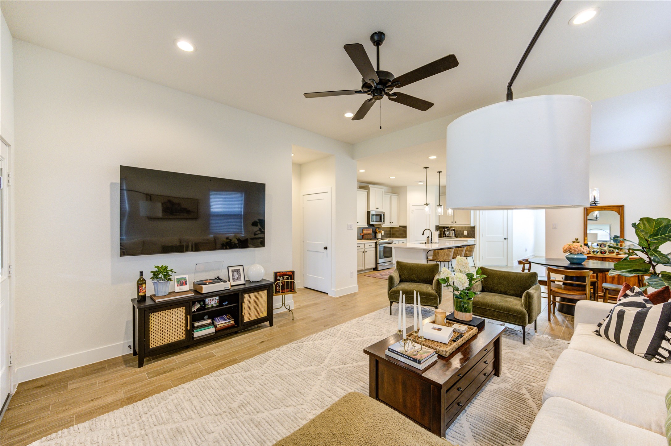 17758 Tree Of Heaven Conroe, TX 77385 - Photo 7 of 44 a living room with furniture and a flat screen tv