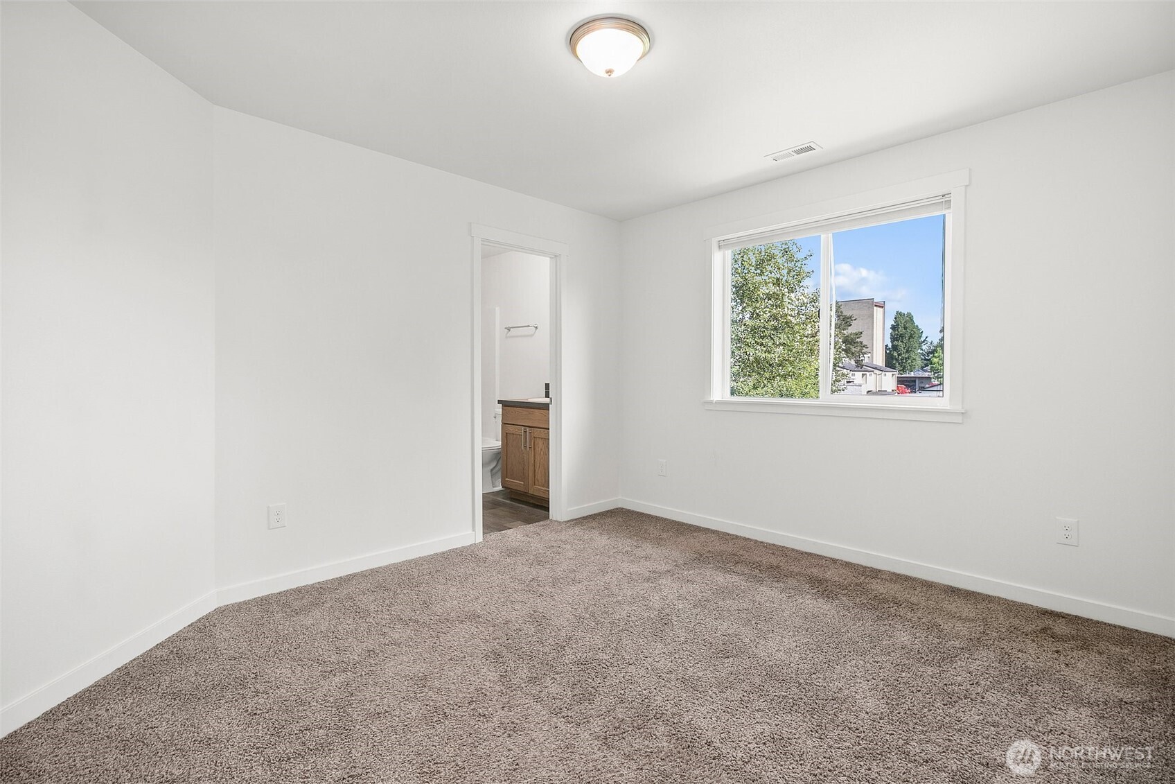 709 3rd Avenue South Kent, WA 98032 - Photo 16 of 26 an empty room with windows