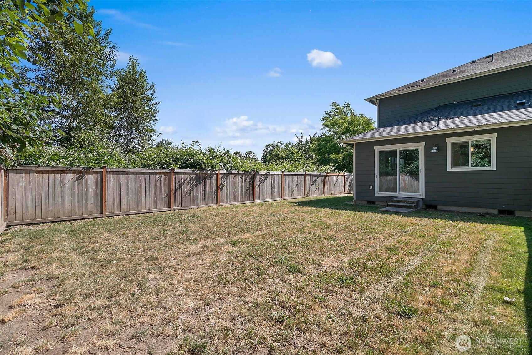 709 3rd Avenue South Kent, WA 98032 - Photo 23 of 26 a view of backyard with wooden fence