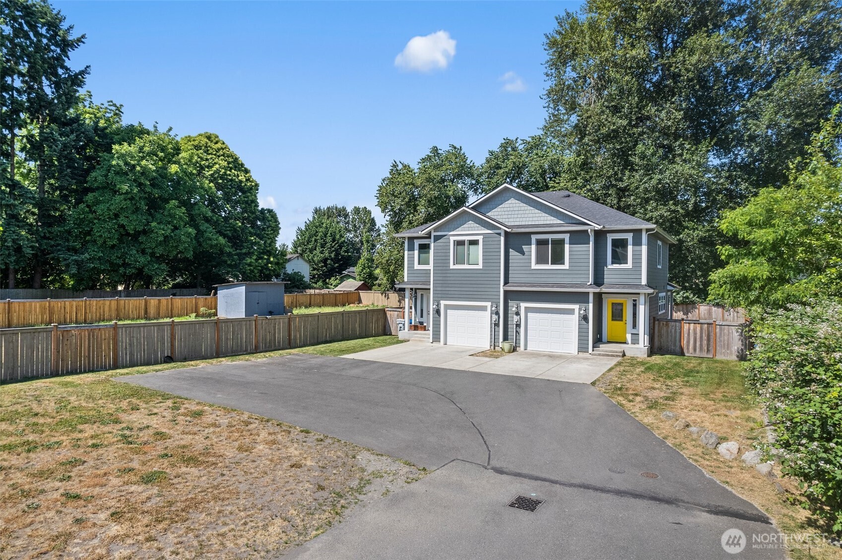709 3rd Avenue South Kent, WA 98032 - Photo 26 of 26 a front view of a house with a garden