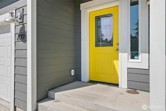 a view of a livingroom with an empty space and a window