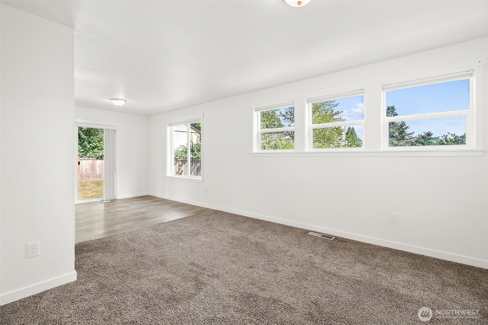 709 3rd Avenue South Kent, WA 98032 - Photo 5 of 26 an empty room with windows