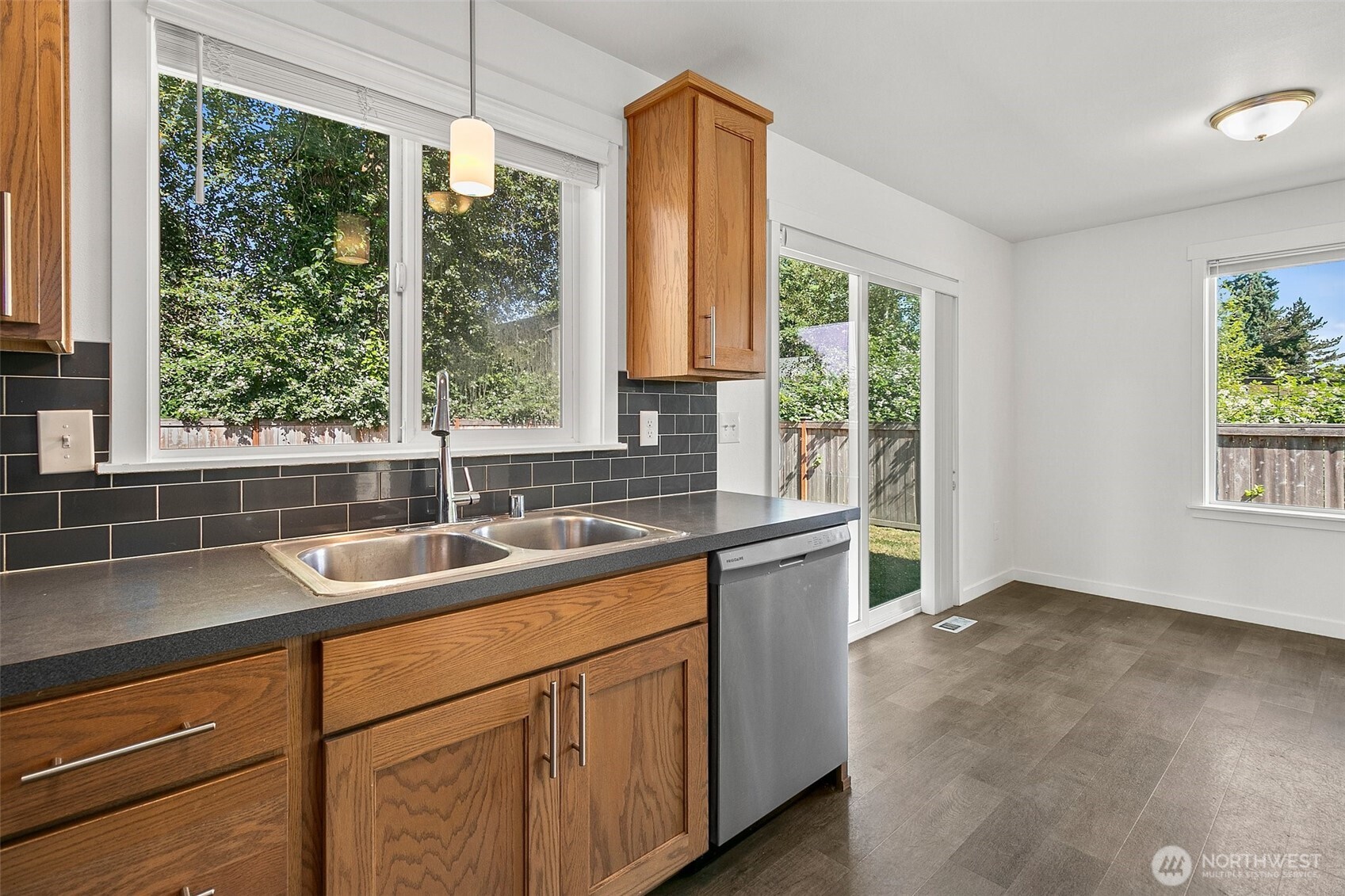 709 3rd Avenue South Kent, WA 98032 - Photo 10 of 26 a kitchen with a sink and large window