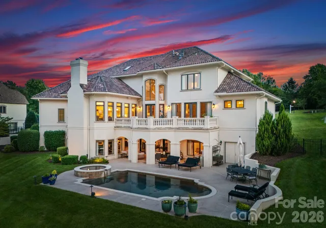 a front view of house with yard and outdoor seating