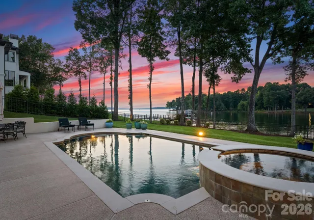 a view of swimming pool with a patio