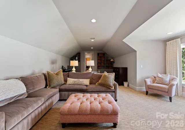 a living room with furniture and a couch