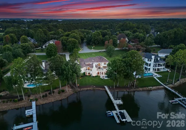 a view of a lake with a yard