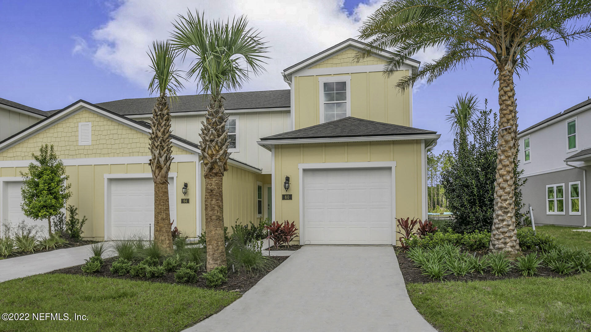 158 Java Lane St. Augustine, FL 32092 - Photo 2 of 31 a front view of a house with a garden