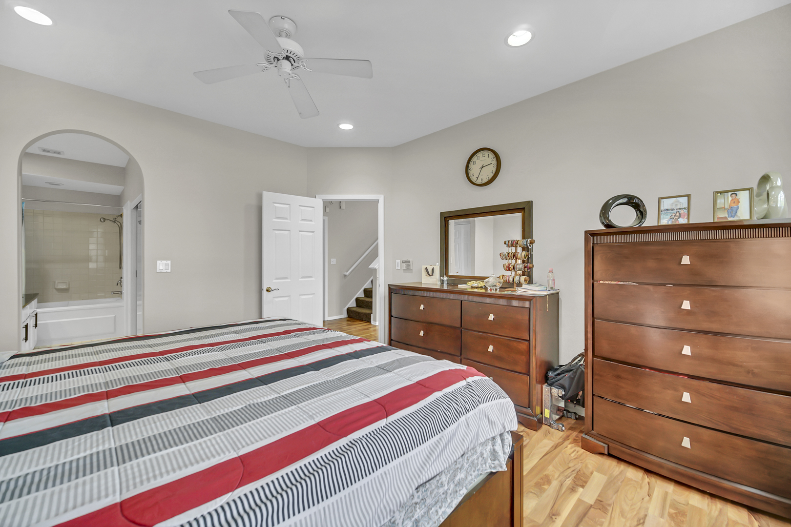 2470 Palazzo Court Buffalo Grove, IL 60089 - Photo 21 of 31 a bedroom with a bed and a dresser in it