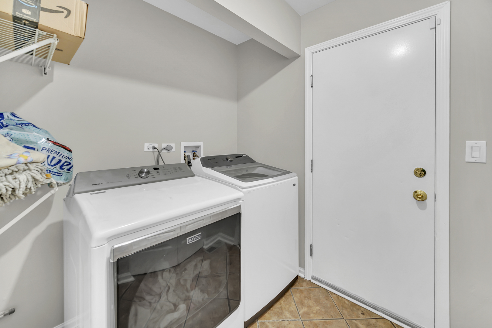 2470 Palazzo Court Buffalo Grove, IL 60089 - Photo 24 of 31 a utility room with dryer and washer