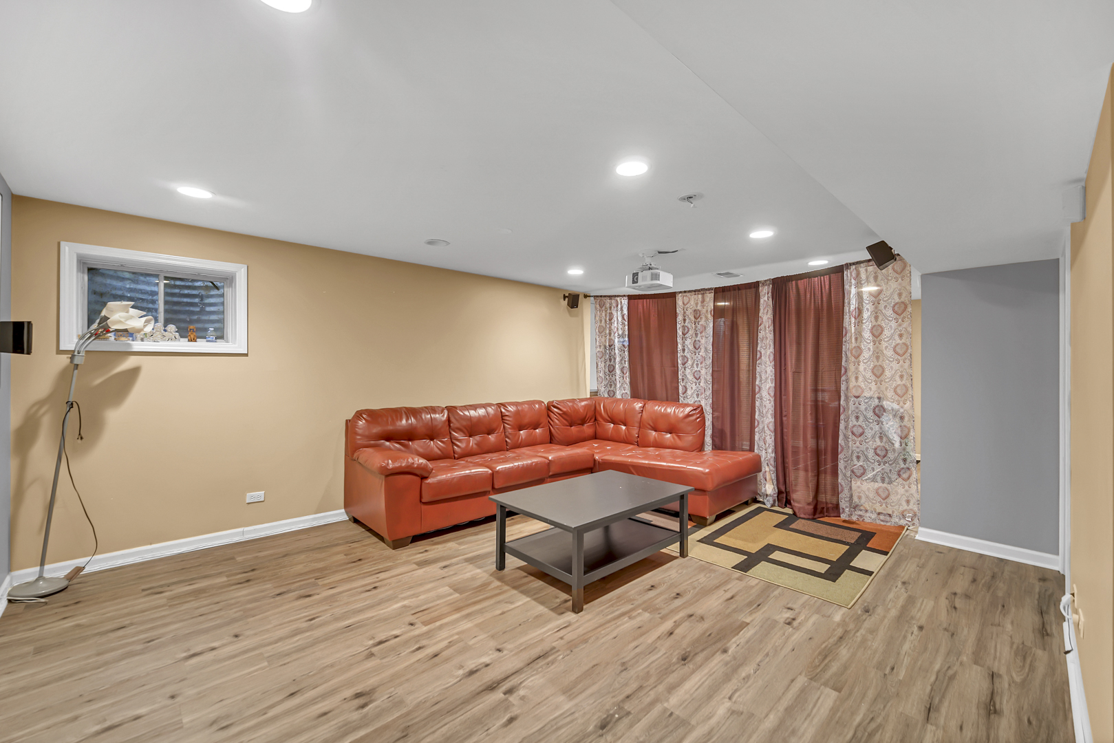 2470 Palazzo Court Buffalo Grove, IL 60089 - Photo 25 of 31 a room with wooden floor and furniture