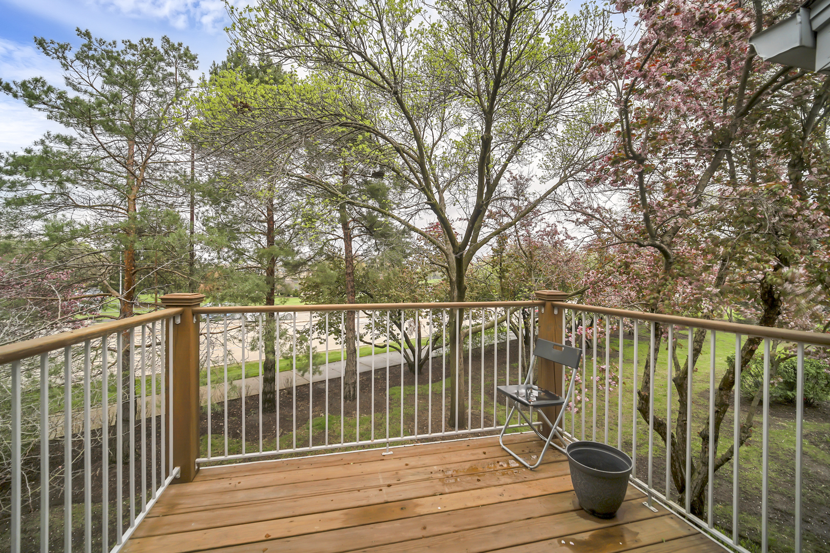 2470 Palazzo Court Buffalo Grove, IL 60089 - Photo 28 of 31 a view of balcony with wooden floor and fence