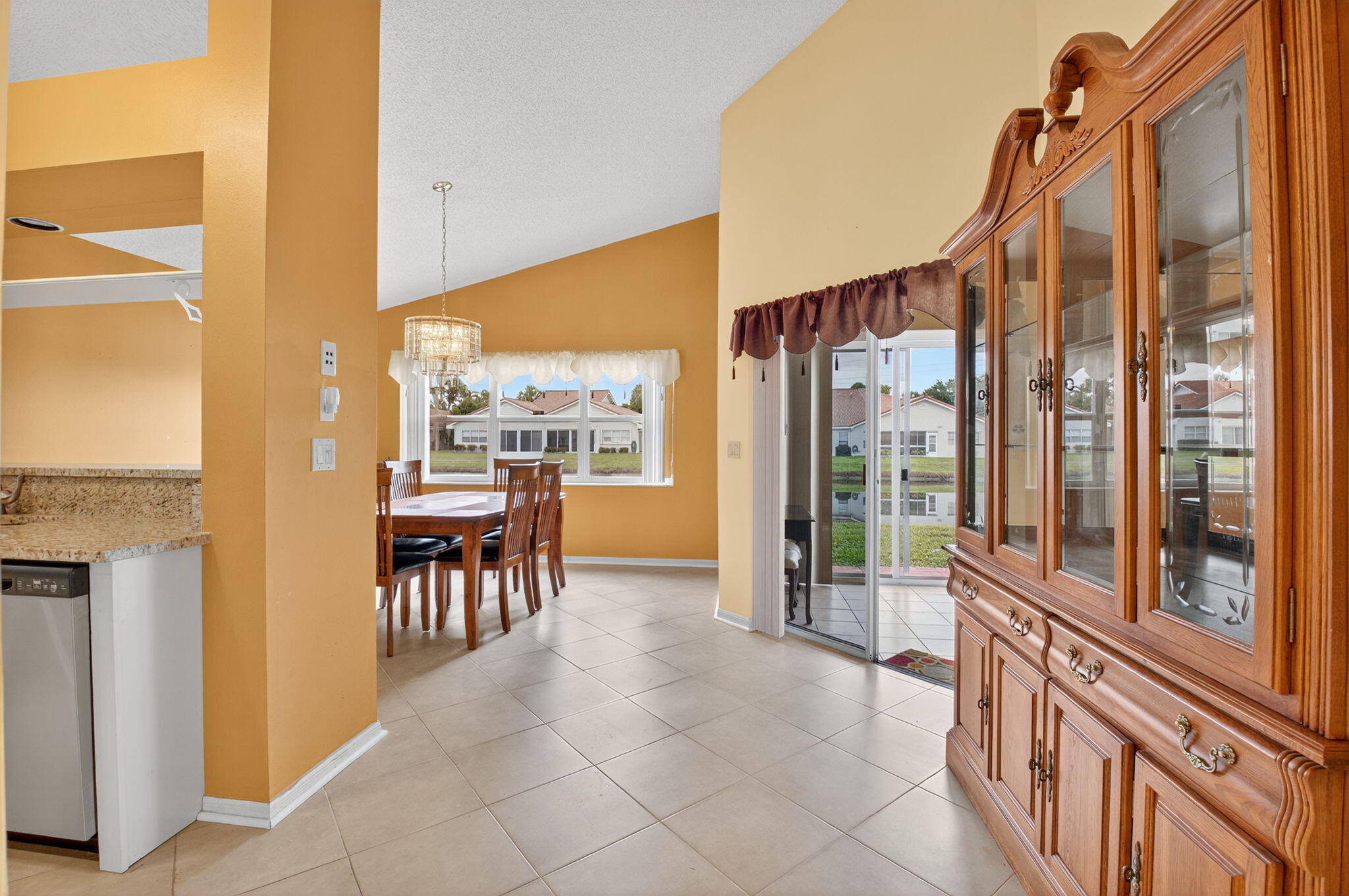 11168 Sangria Court Boca Raton, FL 33498 - Photo 12 of 63 a very nice looking room with a large window and kitchen view