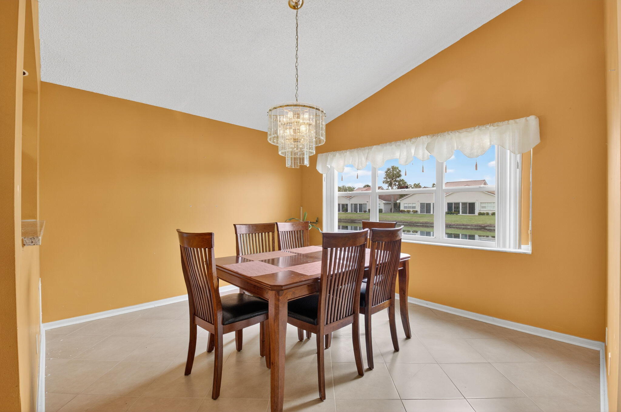 11168 Sangria Court Boca Raton, FL 33498 - Photo 14 of 63 a view of a dining room with furniture and window