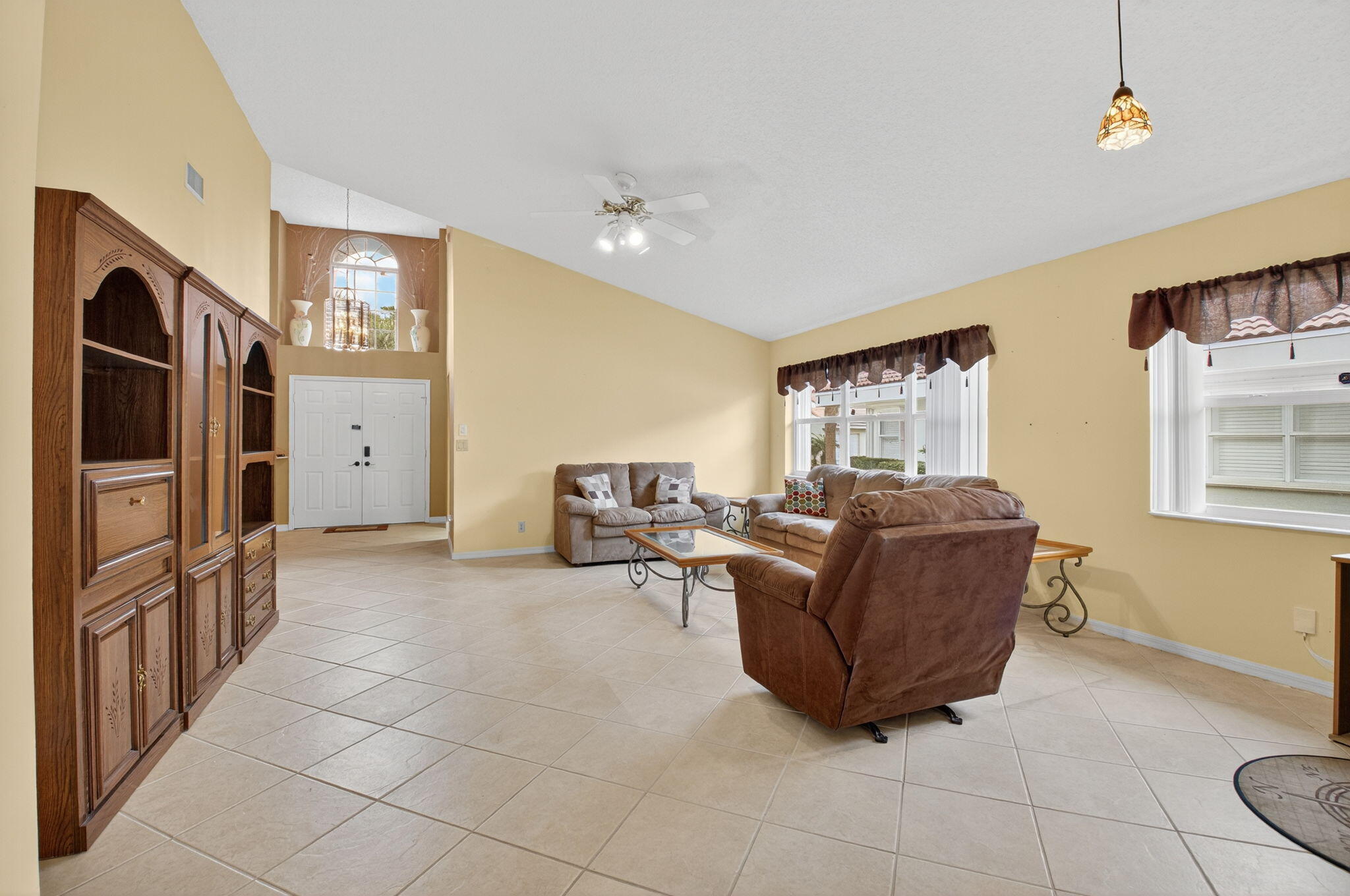 11168 Sangria Court Boca Raton, FL 33498 - Photo 21 of 63 a living room with furniture and a flat screen tv