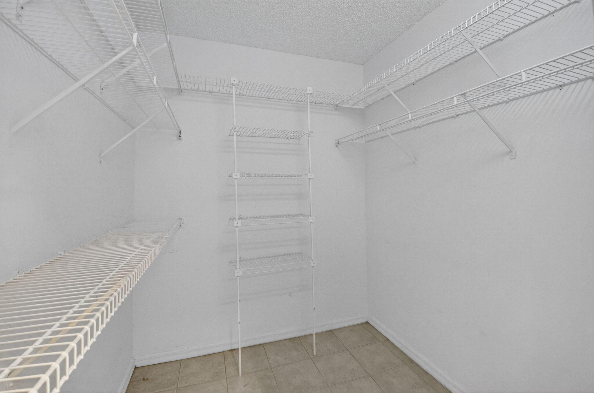 11168 Sangria Court Boca Raton, FL 33498 - Photo 28 of 63 a view of walk in closet