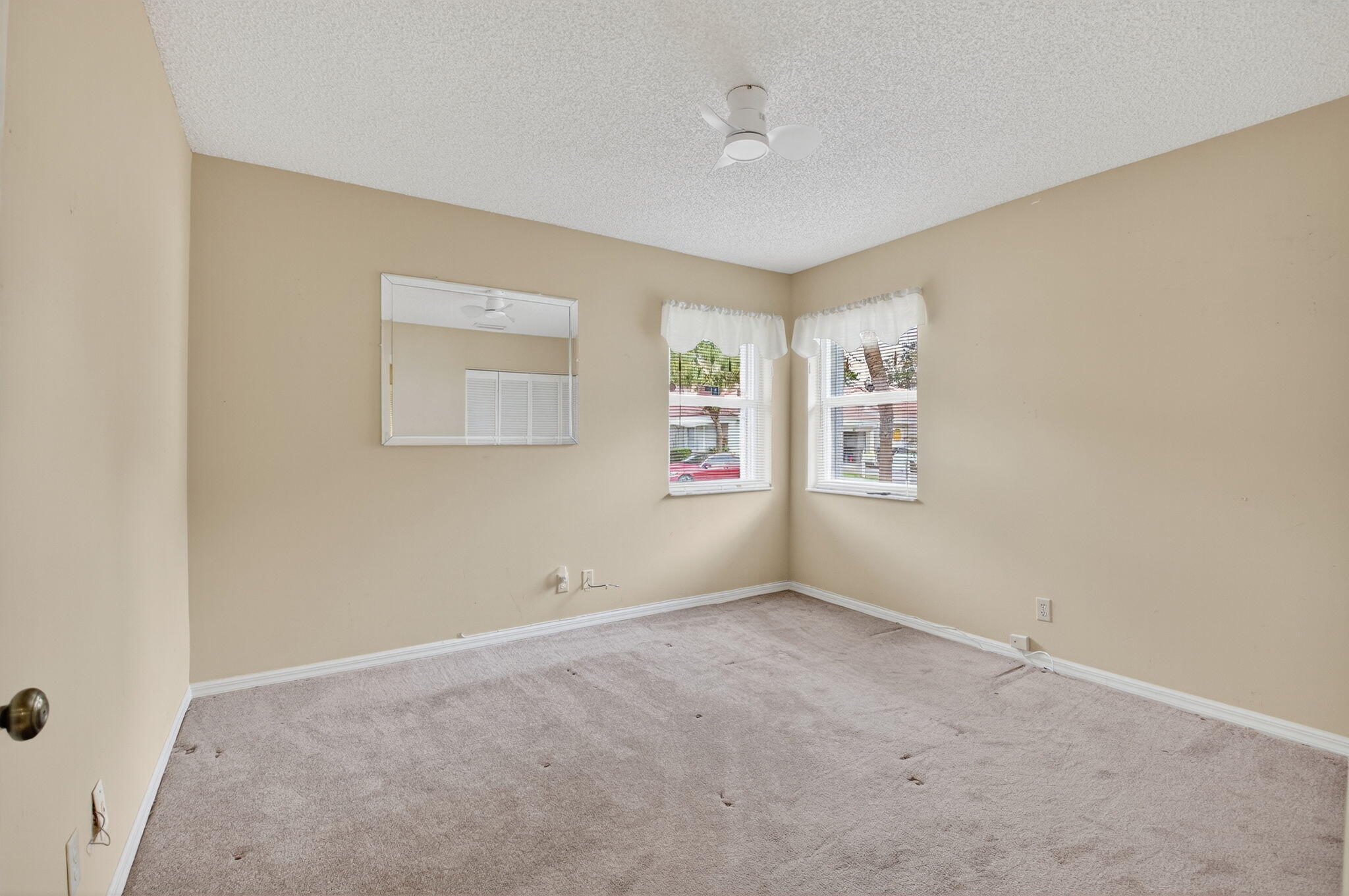 11168 Sangria Court Boca Raton, FL 33498 - Photo 31 of 63 an empty room with windows