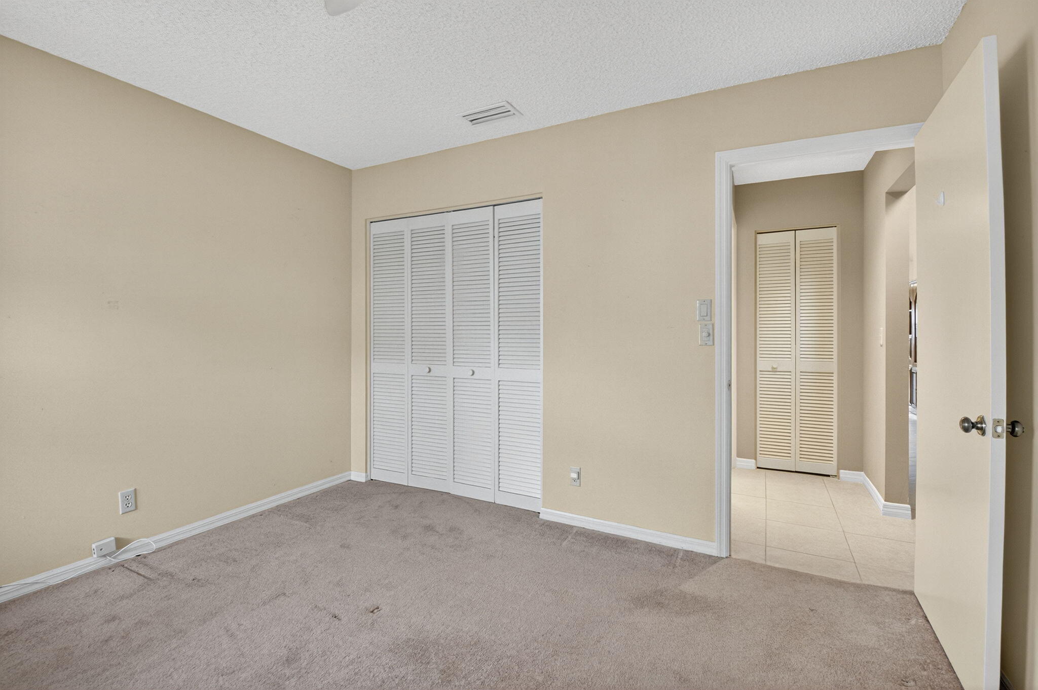 11168 Sangria Court Boca Raton, FL 33498 - Photo 32 of 63 a view of an empty room and closet area