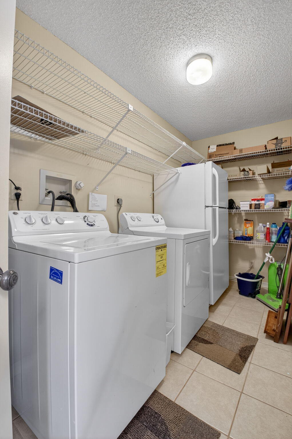 11168 Sangria Court Boca Raton, FL 33498 - Photo 34 of 63 a utility room with dryer and washer