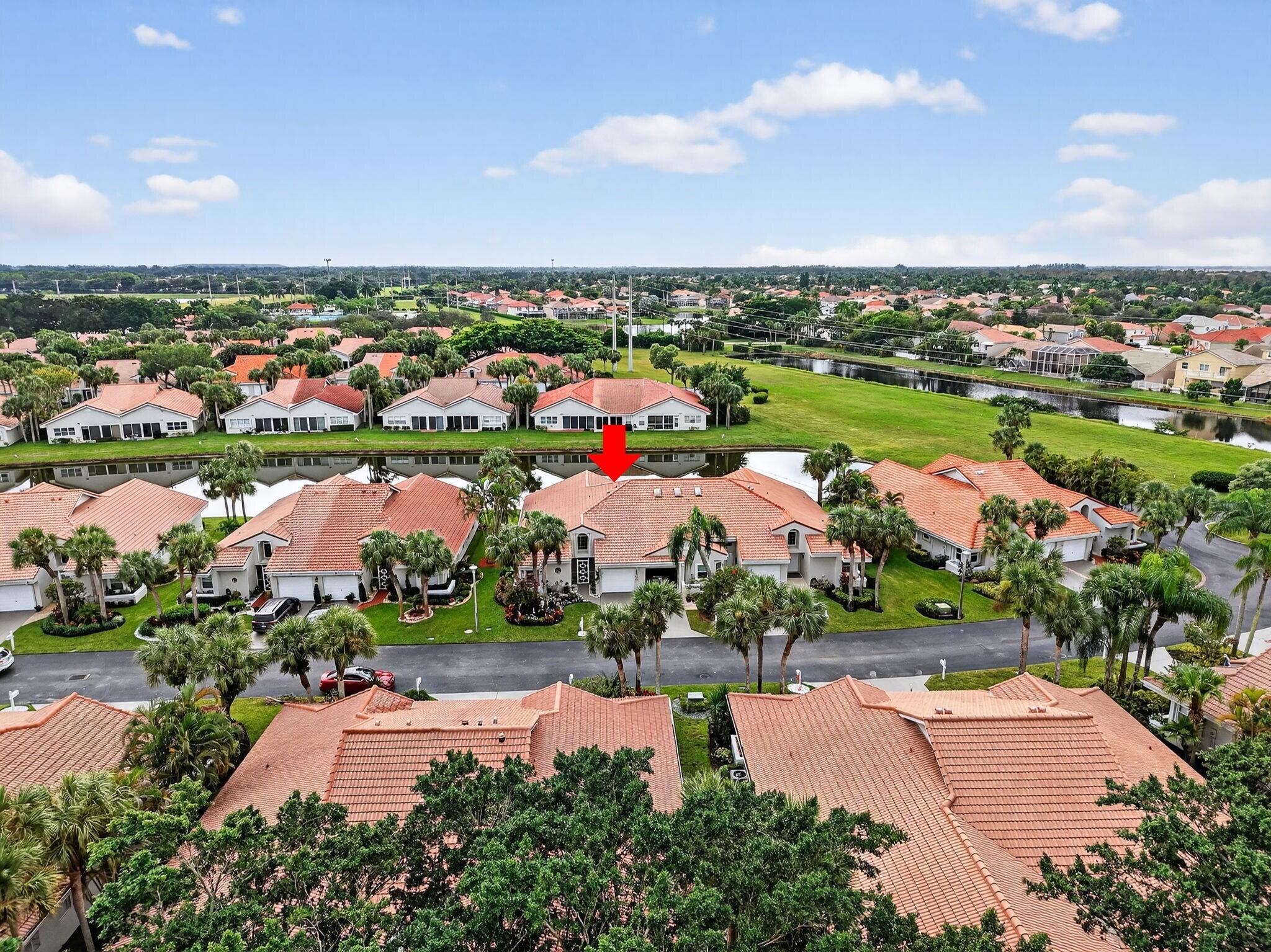 11168 Sangria Court Boca Raton, FL 33498 - Photo 44 of 63 an aerial view of city and lake