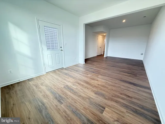 a large kitchen with kitchen island a island in the center