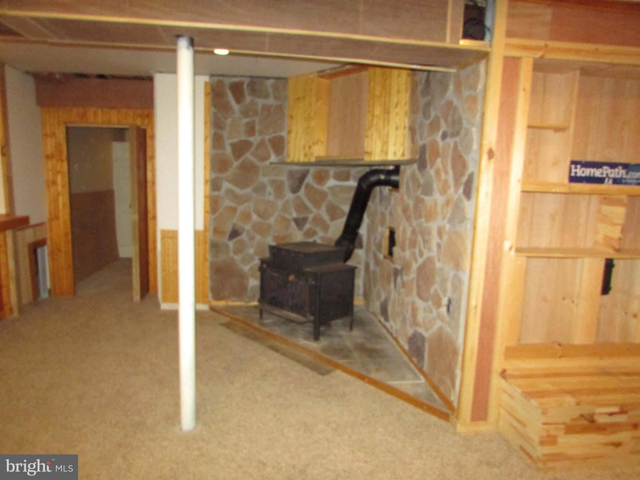 393 Silver Run Valley Road Westminster, MD 21158 - Photo 28 of 30 Woodstove in Rec Room