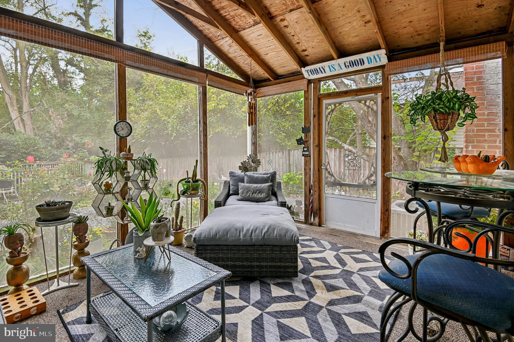 9941 Naylor Avenue Laurel, MD 20723 - Photo 18 of 30 a living room with furniture and a floor to ceiling window