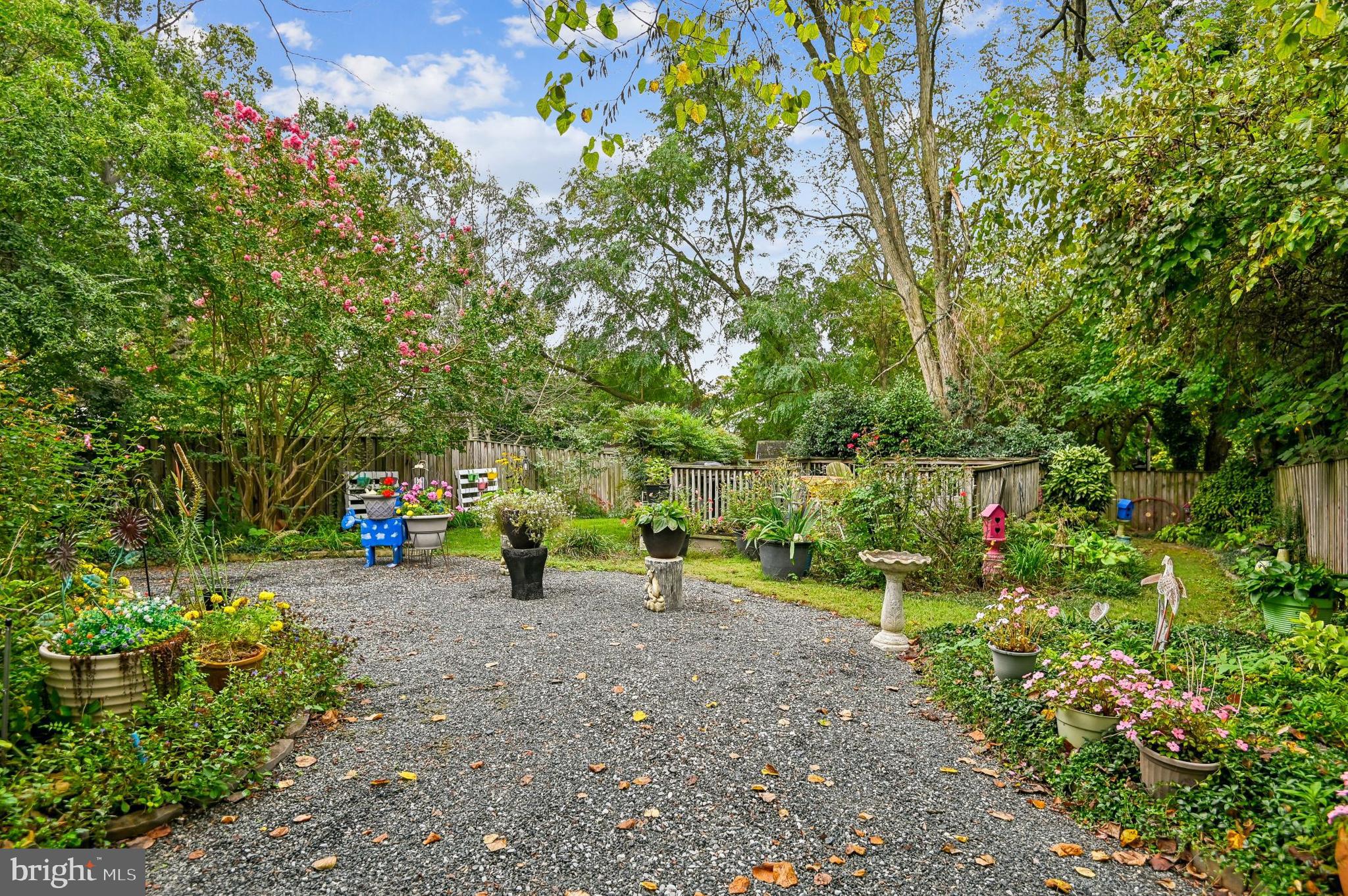 9941 Naylor Avenue Laurel, MD 20723 - Photo 20 of 30 a view of park with large trees and playing area
