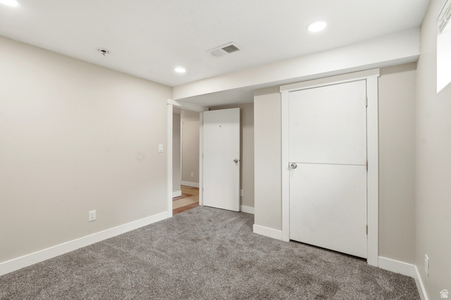 778 East 200 North Logan, UT 84321 - Photo 15 of 43 Neutral-toned room featuring plush grey carpeting and white baseboards