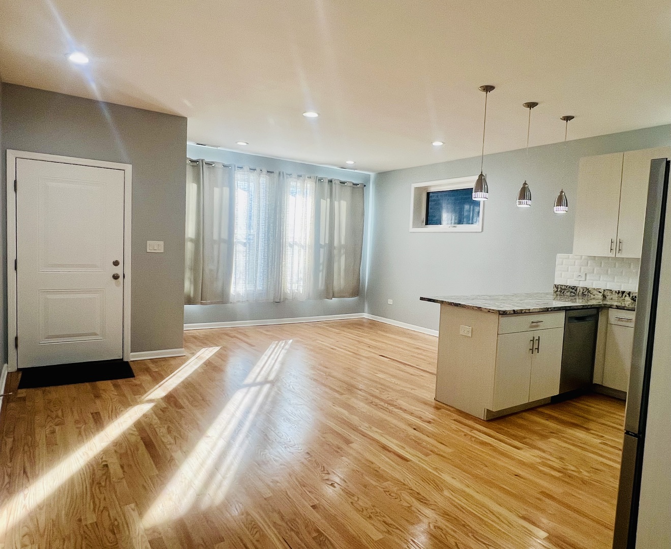 1750 West Cermak Road, Unit B Chicago, IL 60608 - Photo 3 of 18 a view of a kitchen with a sink and dishwasher