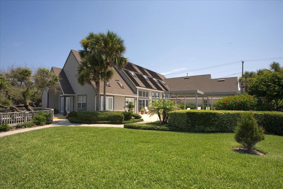 100 North Lake Circle St. Augustine, FL 32084 - Photo 17 of 25 a front view of a house with a yard