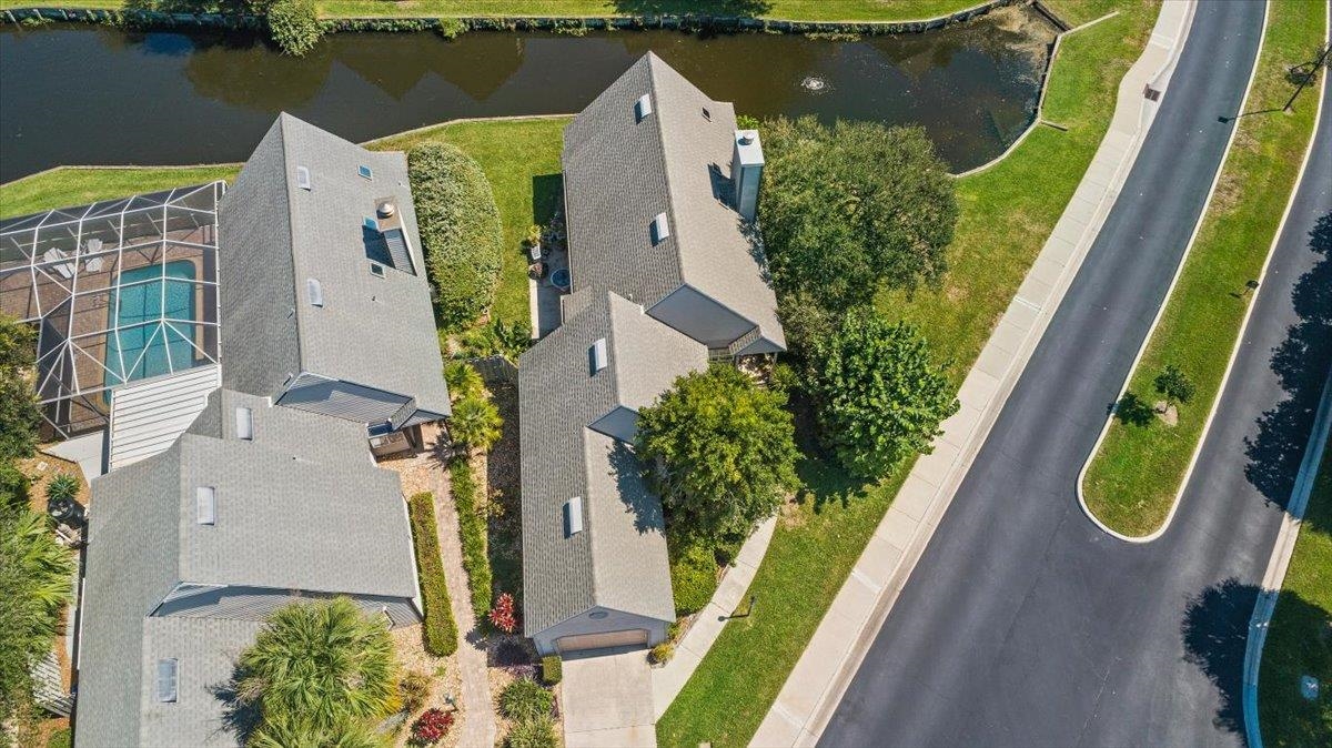100 North Lake Circle St. Augustine, FL 32084 - Photo 21 of 25 an aerial view of a house with outdoor space and a lake view
