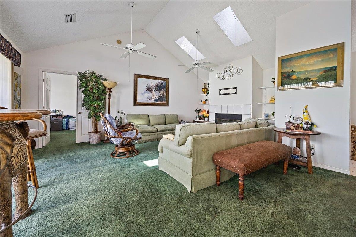 100 North Lake Circle St. Augustine, FL 32084 - Photo 4 of 25 a living room with furniture and paintings on the wall