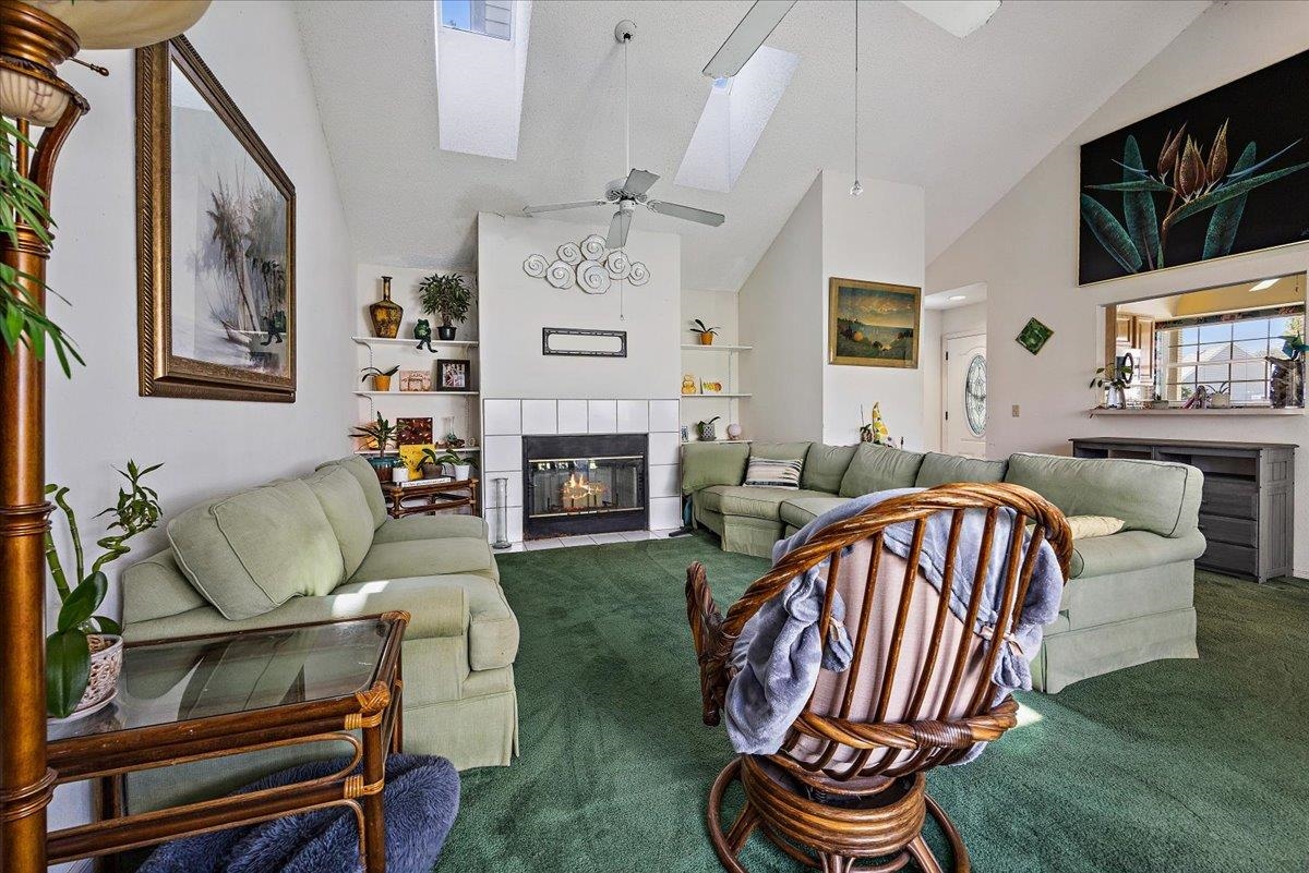 100 North Lake Circle St. Augustine, FL 32084 - Photo 5 of 25 a living room with furniture and a fireplace