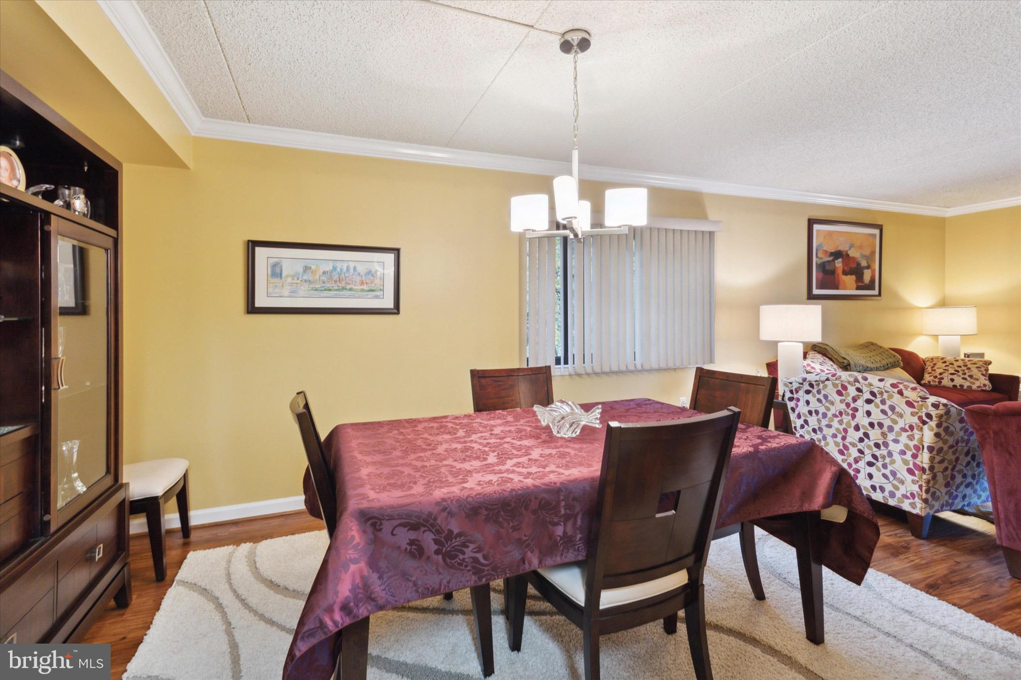 800 Avondale Road, Unit 5L Wallingford, PA 19086 - Photo 7 of 25 a view of a dining room with furniture