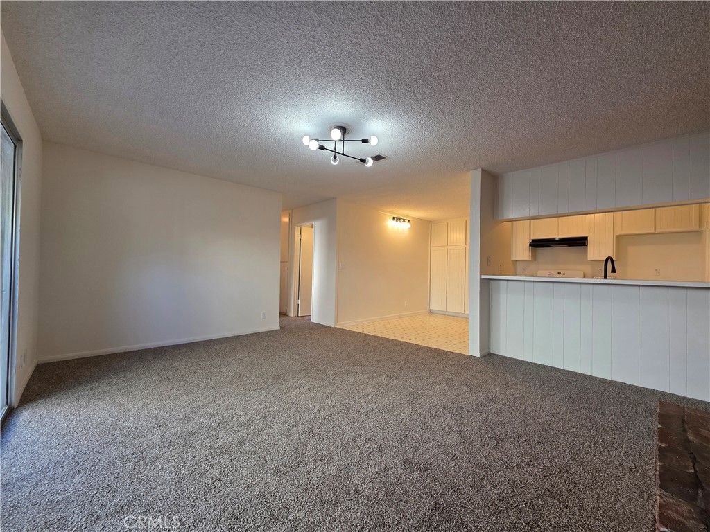 850 Vallejo Avenue Simi Valley, CA 93065 - Photo 12 of 50 a view of an empty room with a kitchen