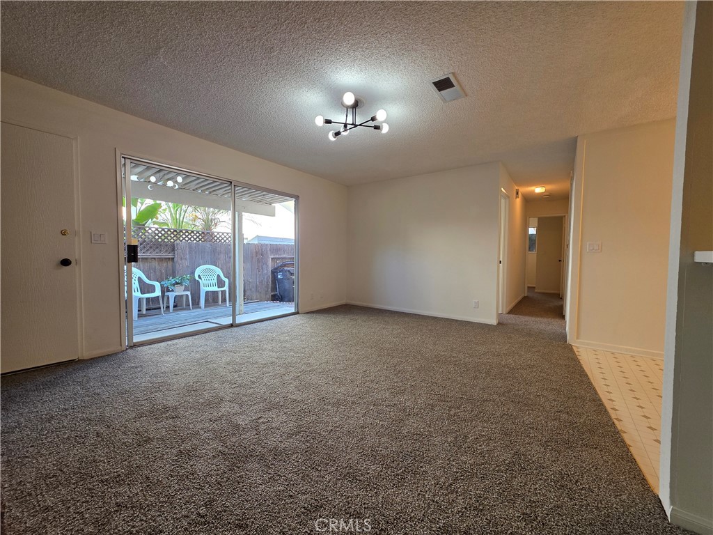 850 Vallejo Avenue Simi Valley, CA 93065 - Photo 13 of 50 an empty room with entrance and windows