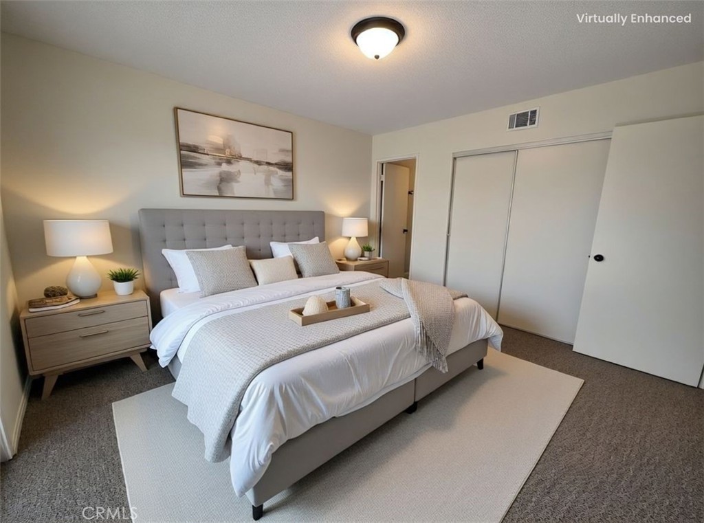 850 Vallejo Avenue Simi Valley, CA 93065 - Photo 15 of 50 a bedroom with a bed and a night stand