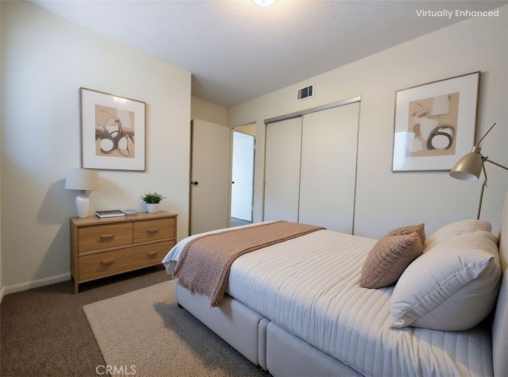 850 Vallejo Avenue Simi Valley, CA 93065 - Photo 18 of 50 a bedroom with a bed and painting on the wall
