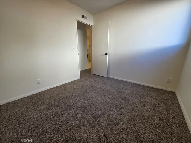 a view of a city with mountains in the background